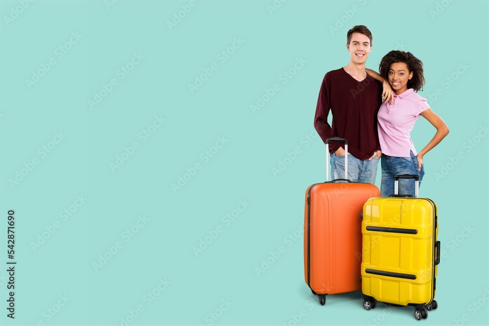 Happy young friends traveler posing with suitcase Happy young friends traveler posing with suitcase