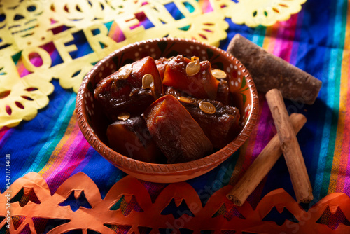 Dulce de Calabaza. Mexican dessert whose main ingredients are pumpkin and piloncillo, also known as Chacualole, Xacualole or Calabaza en Tacha, widely used in Day of the Dead offerings. photo