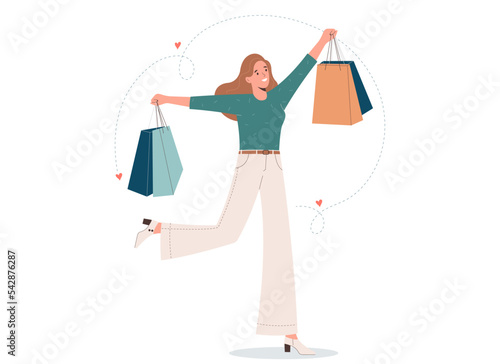Young happy woman holding bags. Big sale, discount, fashion, shopaholic concept.