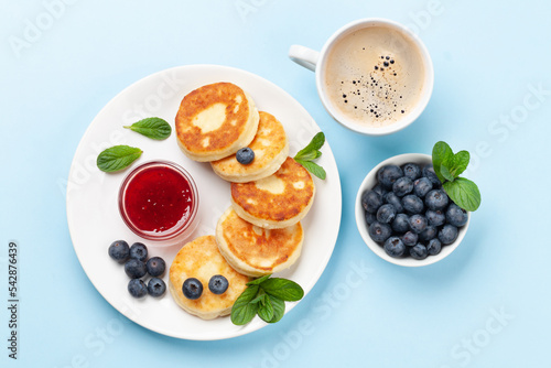 Cottage pancakes with jam and berries