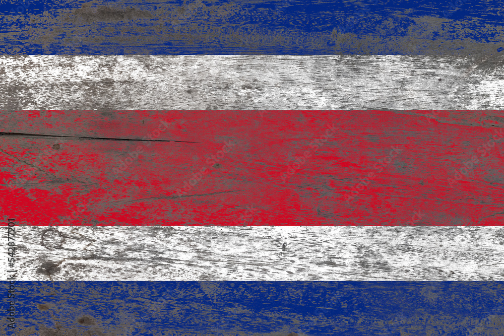 Costa rica flag painted on a damaged old wooden background