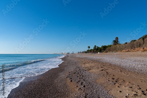 Benicarlo Spain beach platja de la Mar Xica near alegria del mar camping view to south the town between Peniscola and Vinaros photo