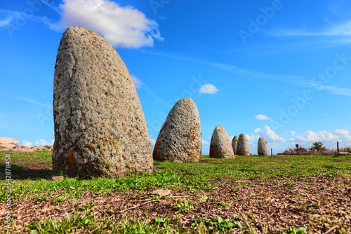 Menhir stones from the bronze age at Archeological site of Tamuli. Macomer, Sardinia, Italy
