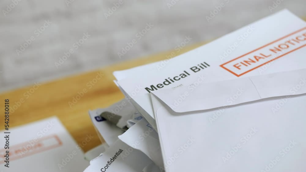 Bill Note Empty Close up of a pile of bills and letters with a medical bill final ...