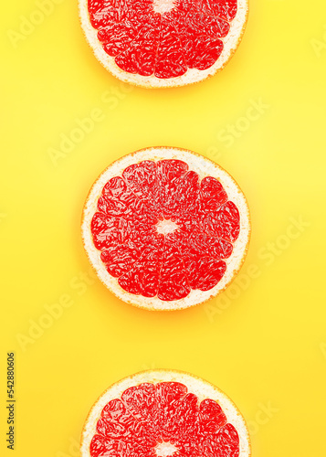 Top view background of sliced fresh grapefruit.