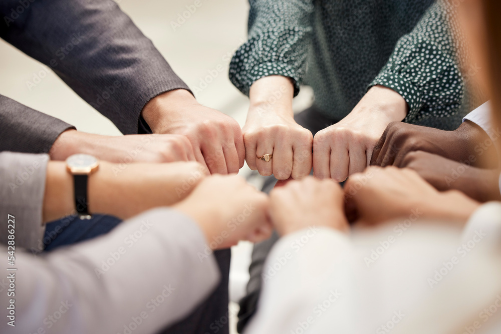 Fist bump, office teamwork and diversity of hands together for business and team support. Team building, community and collaboration success hand sign of company worker staff group about to work