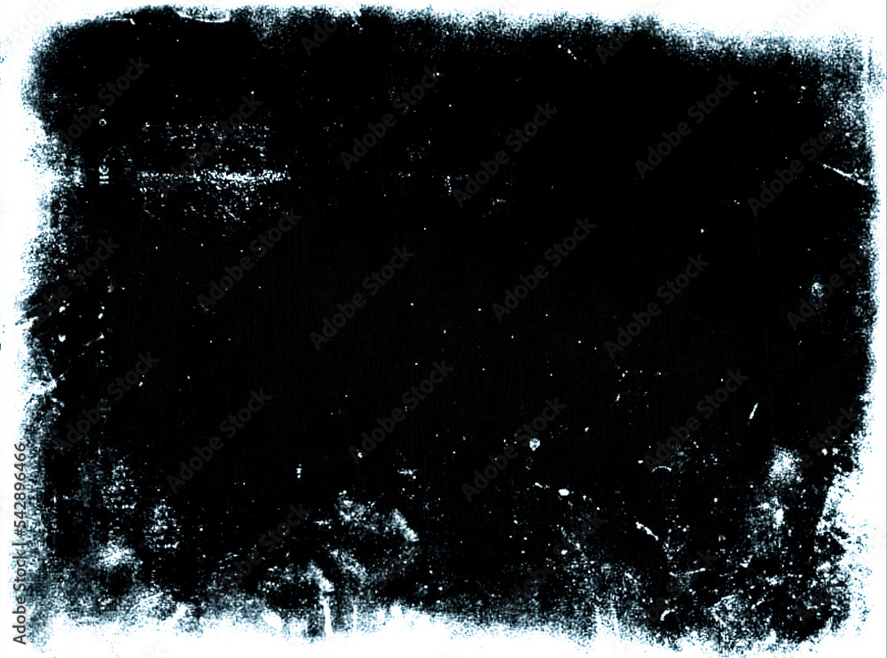A frame of a frosty pattern of ice crystals on a black background. A ...