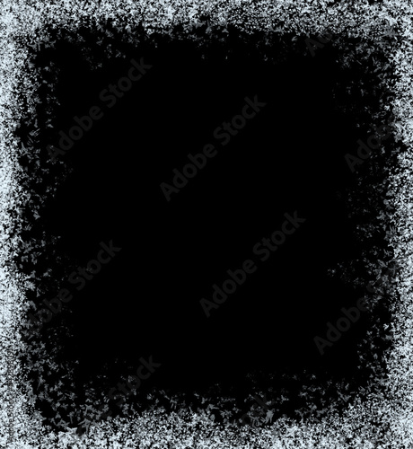 A frame of a frosty pattern  on a black background. A frame with an abstract ice structure allows you to apply or add a frost effect. Frost on the glass, freezing effect