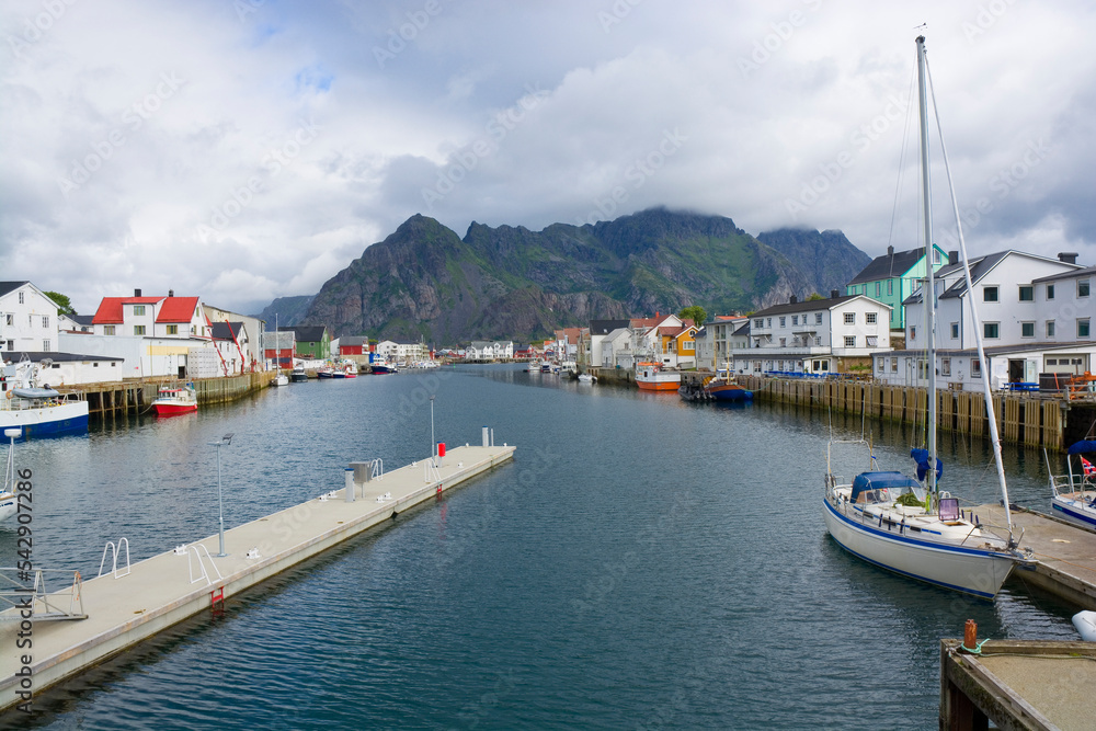 Fototapeta premium Fishing village with traditional wooden houses in Henningsvaer, Lofoten, Norway