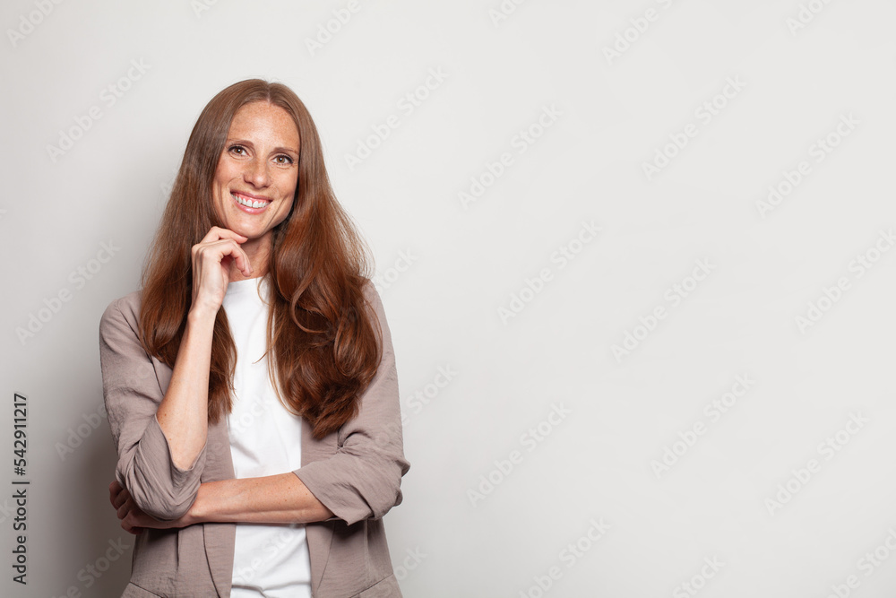 Cute smiling cheerful business woman portrait on a white banner background Cute smiling cheerful business woman portrait on a white banner background