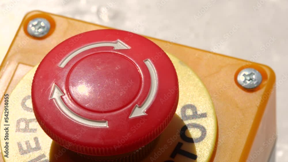 Machine Button Prevention Man pushing, hitting a simple red industrial machine emergency stop ...