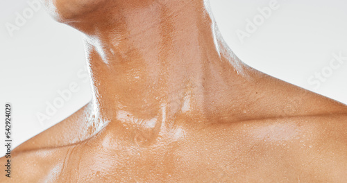 Bilde på lerret Body of man sweating from exercise, skin neck with water dripping or wet body cropped on white studio background