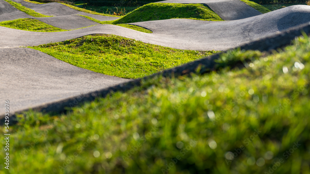 Outdoor bicycle asphalt pumptrack surrounded by nature in Polanka Wielka, Poland.