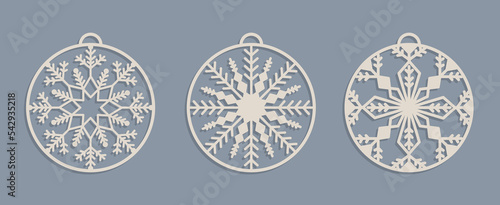 Set of Laser cut Christmas baubles Templates. Christmas tree wood decorations balls with snowflakes