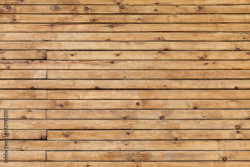 Wooden wall made of uncolored planks, background texture
