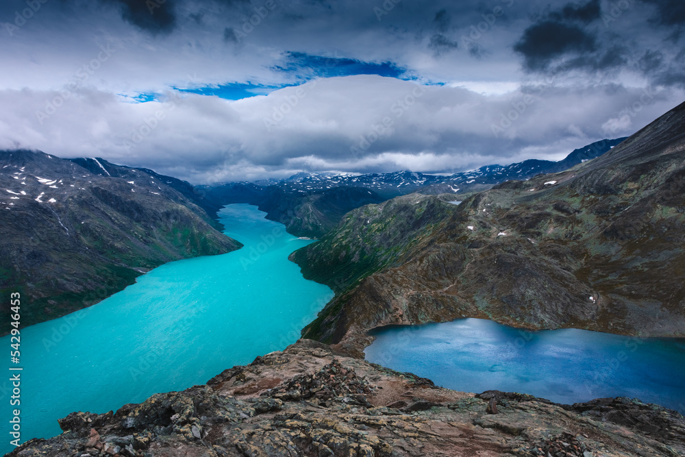 Amazing view of the Besseggen ridge,  famous hiking spot in Jotunheimen National Park, admiring two glacial lakes with different colors