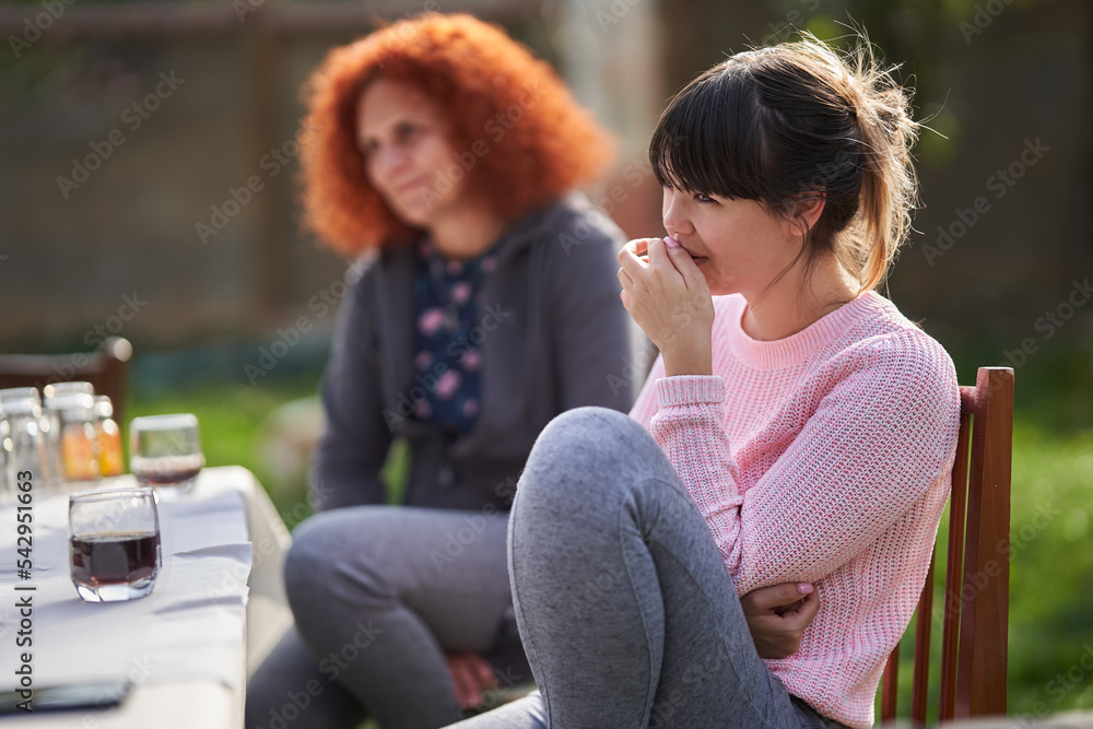 Mother and daughter chatting outdoor Mother and daughter chatting outdoor