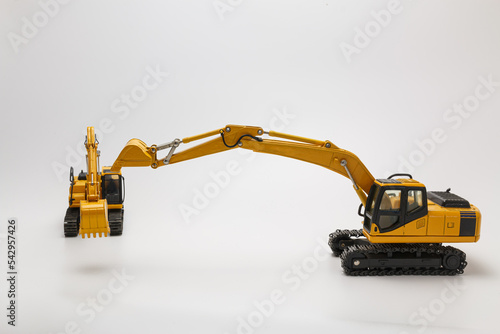 Crawler excavator  with bucket lift up  on  white background.