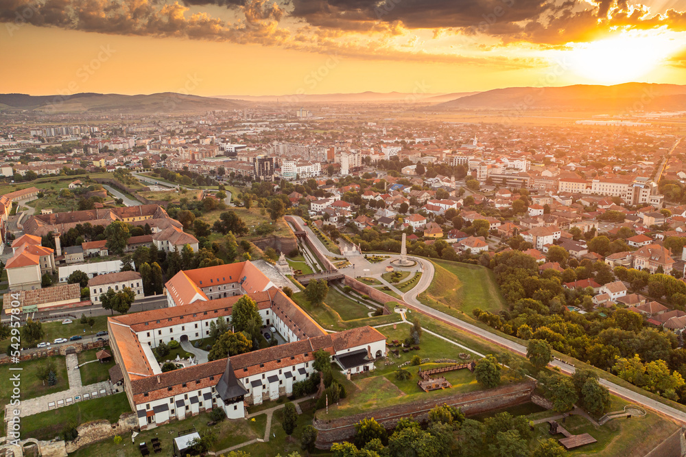 Amazing aerial view of a sunrise over Alba Iulia city and Alba Carolina fortress from Transylvania, Romania.