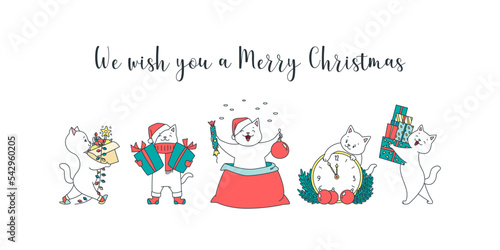 We wish you a merry Christmas. Collection of cute kittens celebrating winter holidays isolated on a white background. Vector 10 EPS.