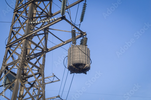 High-frequency protector for creating high-frequency communication channels on a high-voltage power line. Power filter, suppressor. Special equipment on communication lines. Selective focus photo