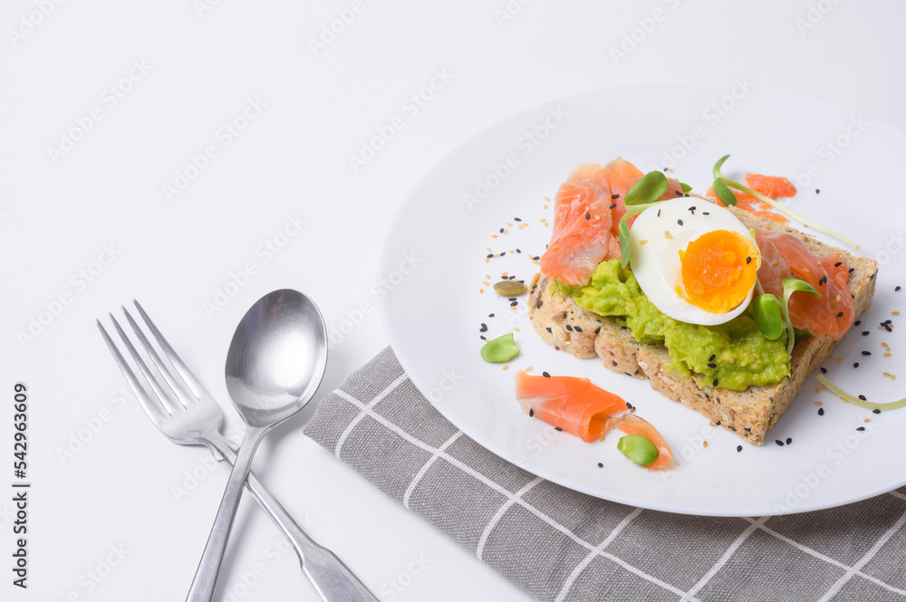 Bread with avocado , vegetables fruit and egg on white background , Healthy breakfast concept Bread with avocado , vegetables fruit and egg on white background , Healthy breakfast concept