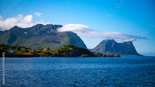 panorama of the coast of the island of senja in norway; turquoise water and mighty mountains in northern norway