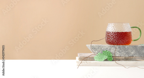 cup of healthy tea. Concept modern dishes, tempered glass, asian style, east, ceremony, tradition, ritual. Copyspace, banner (ID: 542979655)