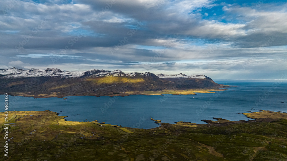 aerial view on icelandic fjords from drone covered with snow