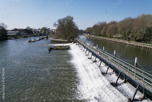 Teddington wier river Thames UK drone aerial view. photo