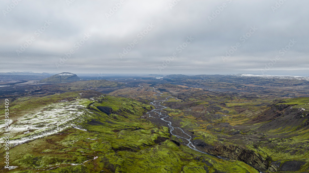 aerial view on green iceland landscape with snow aerial view on green iceland landscape with snow