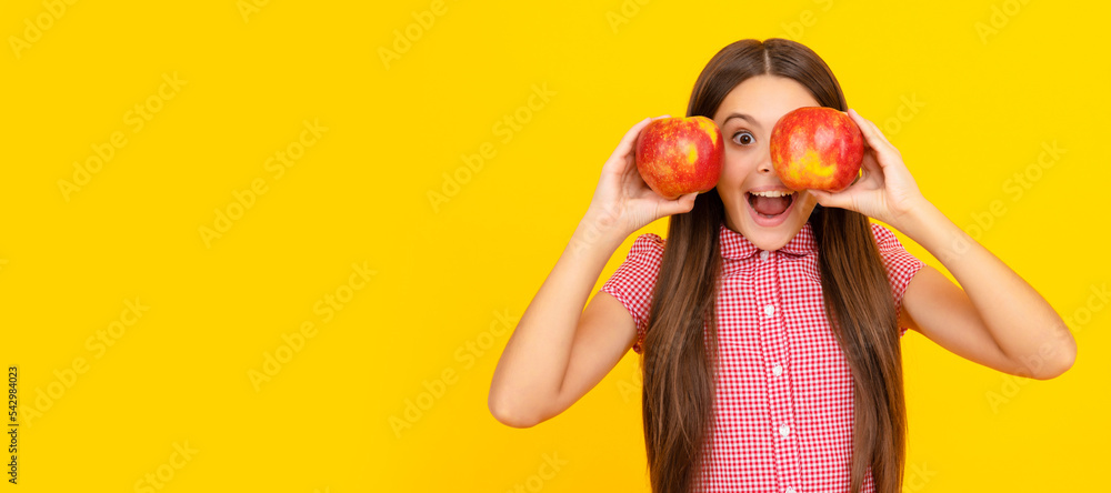 amazed kid hold healthy apple fruit with vitamin. Child girl portrait with apple, horizontal poster. Banner header with copy space. amazed kid hold healthy apple fruit with vitamin. Child girl portrait with apple, horizontal poster. Banner header with copy space.