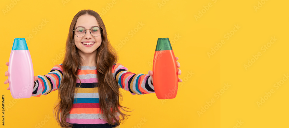 child with hair conditioner. daily habits and personal care. skin scrub care beauty. Banner of child girl hair care, studio poster header with copy space. child with hair conditioner. daily habits and personal care. skin scrub care beauty. Banner of child girl hair care, studio poster header with copy space.