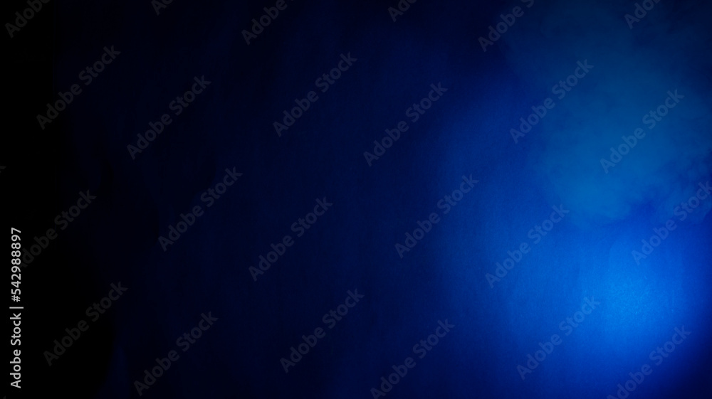 Blue abstract background with natural paper texture and light from one side Blue abstract background with natural paper texture and light from one side