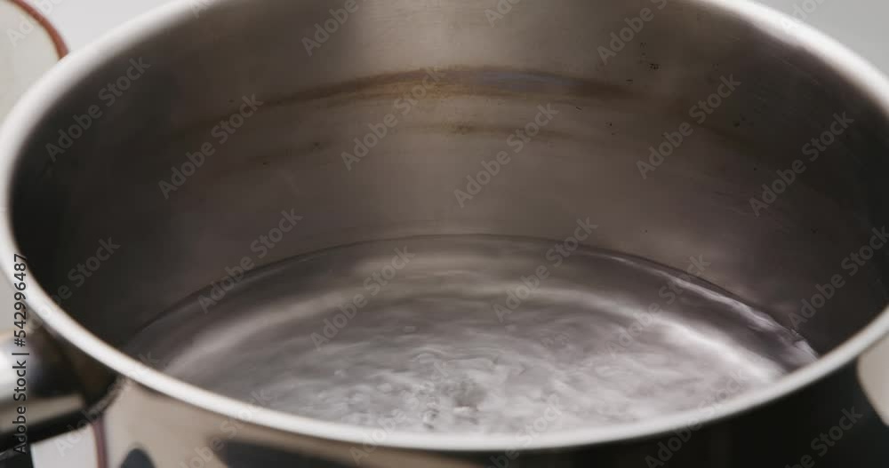 Cooking instant noodle in kitchen Cooking instant noodle in kitchen