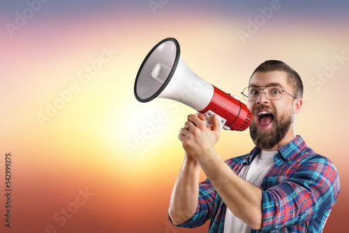 Fotomurale Young man hold megaphone and scream