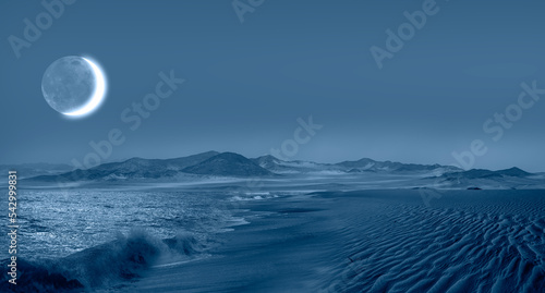 Fototapeta Naklejka Na Ścianę i Meble -  Namib desert with Atlantic ocean meets near Skeleton coast at night crescent moon in the background - 
Namibia, South Africa 