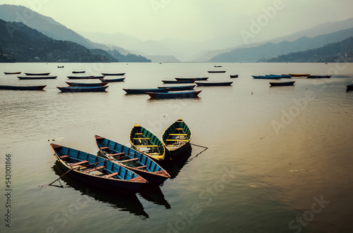 Blue boats on Lake Phewa Pokhara Nepal 
