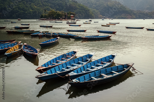 Blue boats on Lake Phewa Pokhara Nepal 