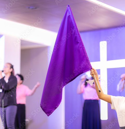 people waving flags worshiping God jesus