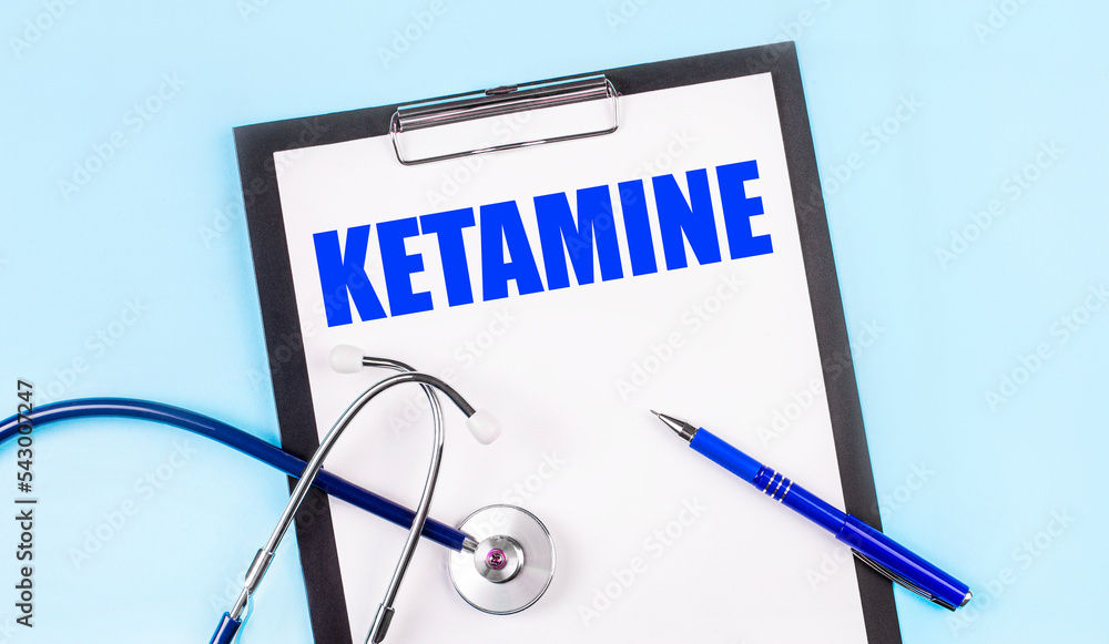 custom made wallpaper toronto digitalOn a blue background, a stethoscope, a pen and a tablet with paper and the text KETAMINE. Medical concept