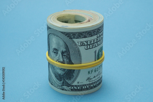 Dollars rolled up into a tube.