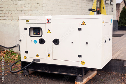 emergency generator for uninterruptible power supply, diesel plant in an iron case with an electrical power management switchboard.