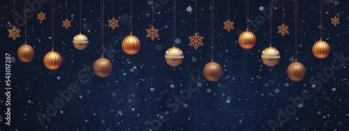 Christmas celebration holiday background banner template greeting card panorama - Group of hanging golden balls baubles, ice crystals and silver stars on dark blue snowy night sky, with snowflakes