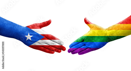 Handshake between LGBT and Puerto Rico flags painted on hands, isolated transparent image.