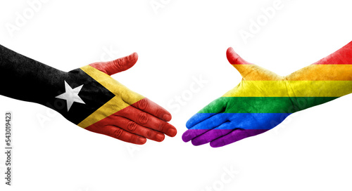 Handshake between LGBT and Timor Leste flags painted on hands, isolated transparent image.