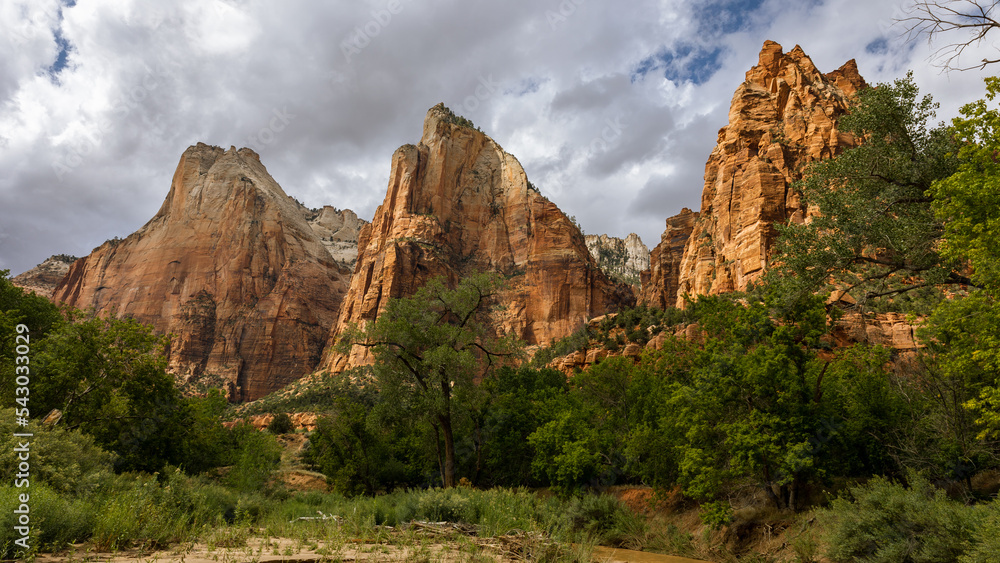The Court of the Patriarchs is a grouping of sandstone cliffs in Zion National Park. The mountain is named after the biblical figures of Abraham, Isaac, and Jacob.