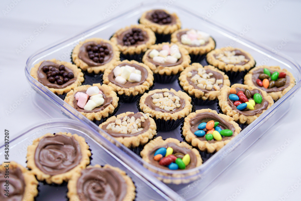 Cheese tart, chocolate tart, strawberry tart and various types of tarts are served to be eaten on Eid.