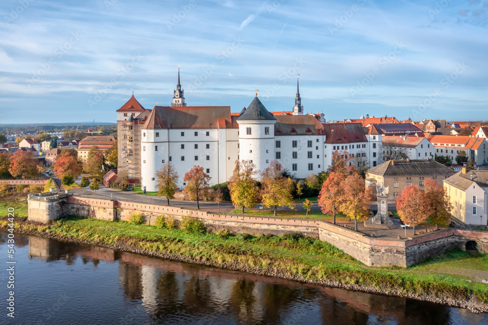 Obraz premium Torgau, Germany. Aerial view of historic castle Schloss Hartenfels in the autumn