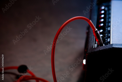 jack cable plugged into amp for concert prep and backstage setup